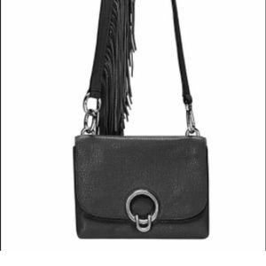 Like new (used once) adorable bag, could also be used as a clutch.